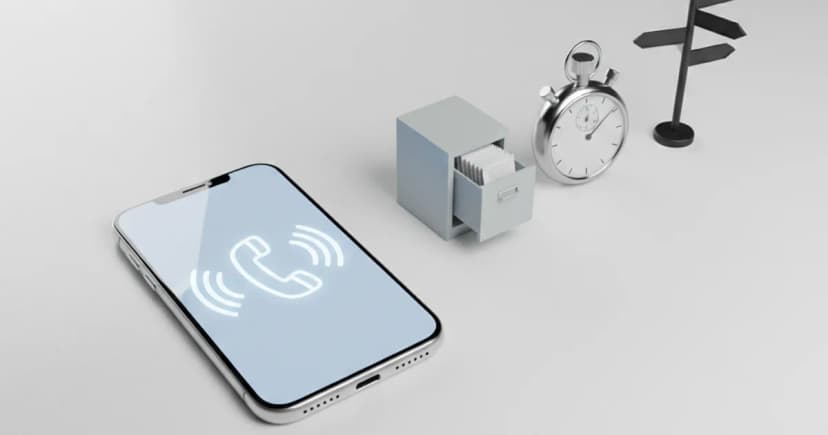 A clean 3D render of a modern smartphone lying face-up on a minimalist white desk, its screen displaying a simple, glowing phone receiver icon surrounded by